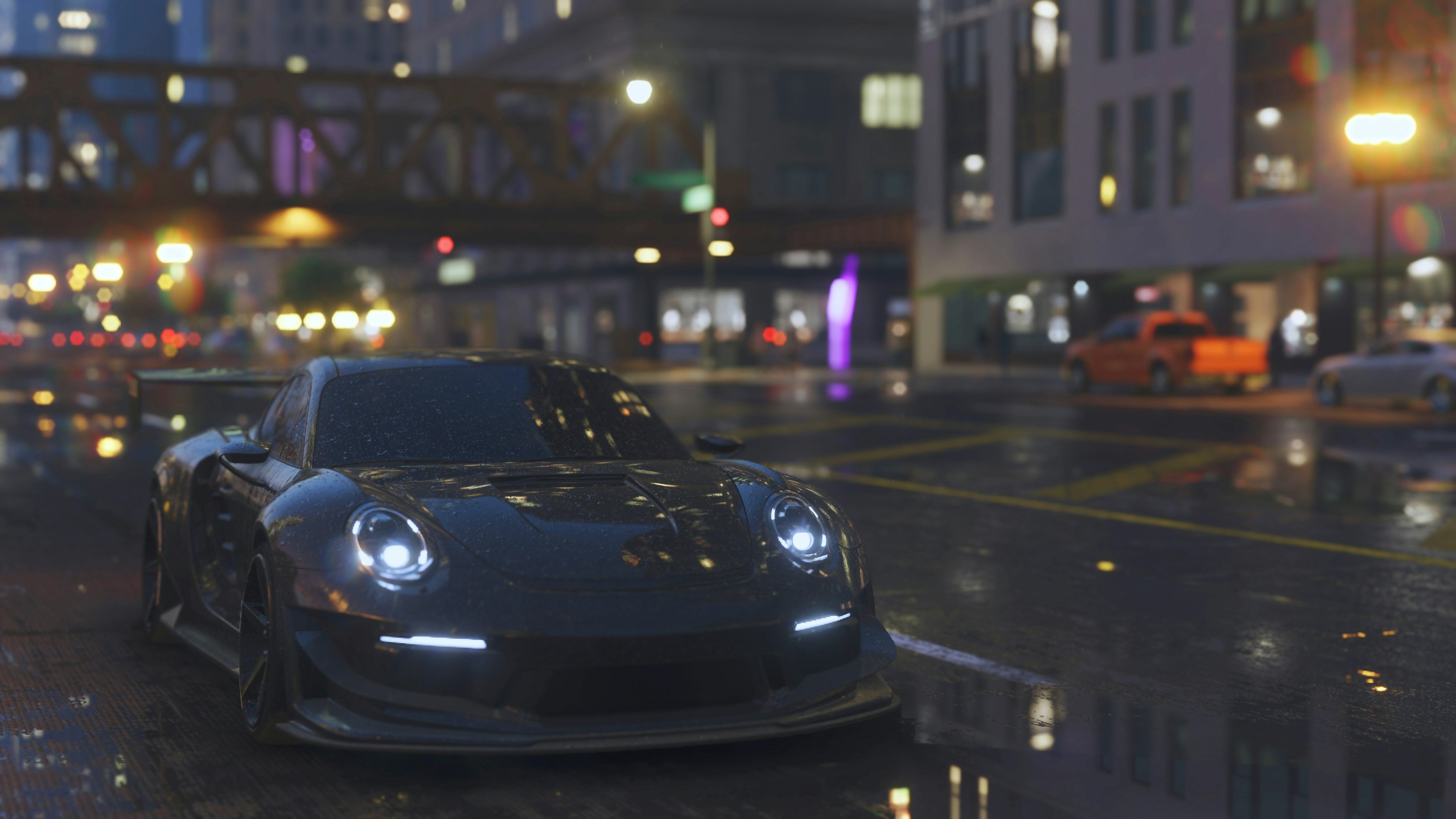 Modified sports car at a St. Louis night meet with city lights reflecting off the hood